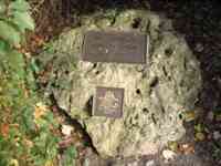 Memorial plaque set in stone