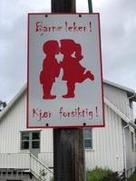 “Children playing! Drive carefully!”