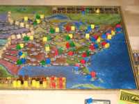 Board game with fuel and houses on map with power grid.