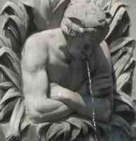 Fountain with water coming out of a man's mouth