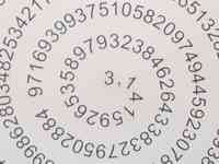 Digits of π written in a spiral on a wall