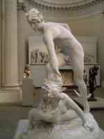 Statue of Perseus fighting the Gorgon, who is screaming in pain