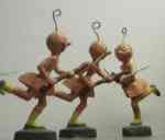 Toy martians with guns and bayonets