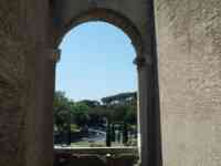 Roma seen through Colosseum arch