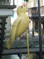 Yellow sparrow sculpture with pale mottling