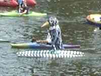 Person in sparrow costume on raft