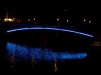 Bridge with bottom of arch lined with blue lights