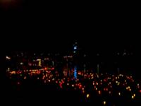 Red and yellow candles floating in the Danube
