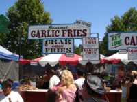 Stand selling garlic fries and crab garlic fries