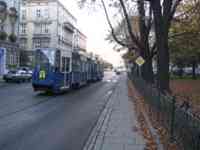 Blue streetcar in street