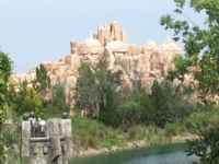 Stone temple seen across a river