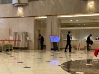 Employee bowing at Hotel Granvia