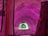 Purple lights in cable car tunnel